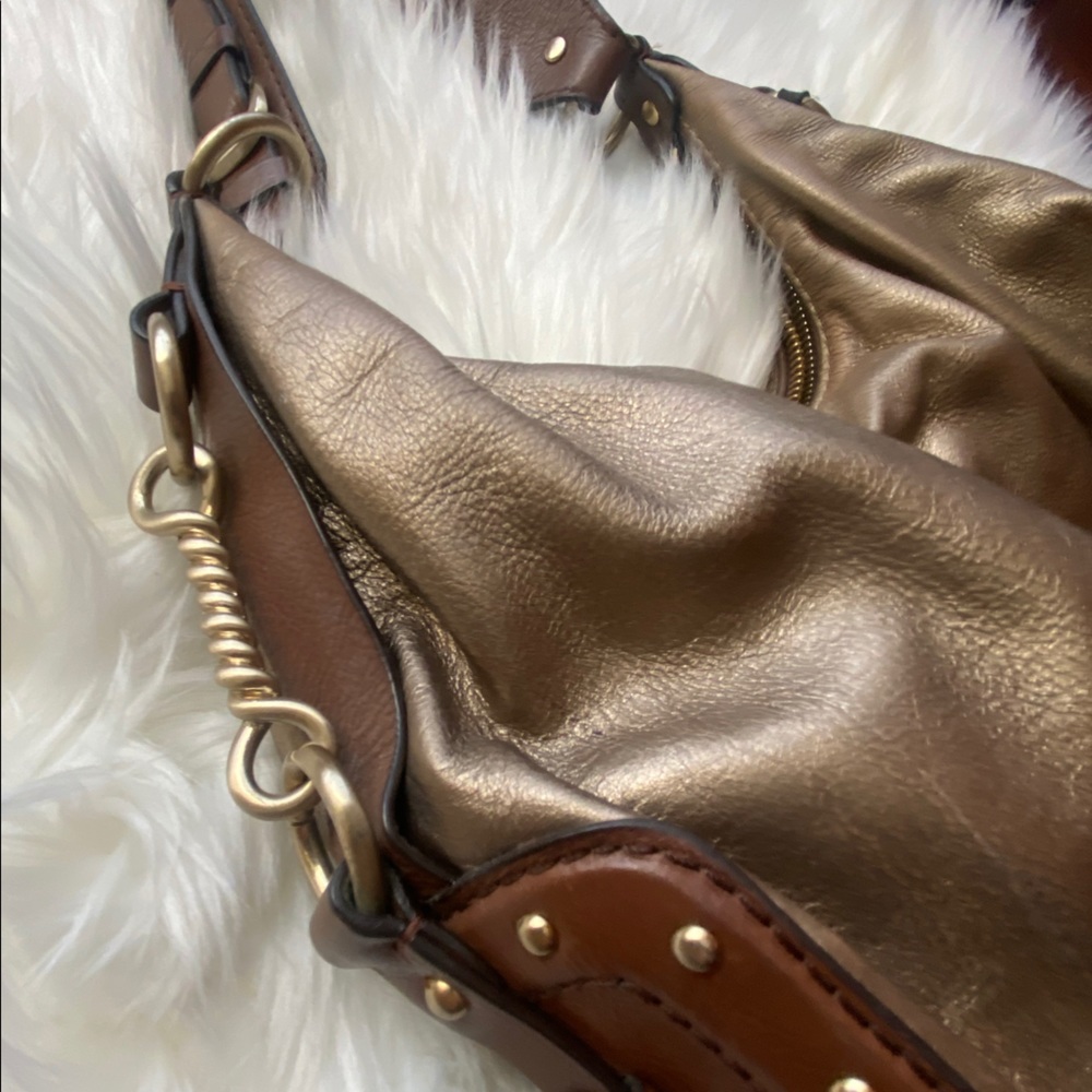 Michael Kors gold bag with buckle